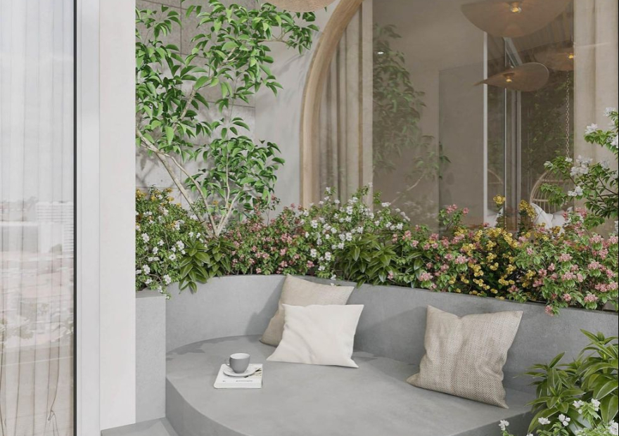 Không gian ban công xanh kết hợp tiểu cảnh hiện đại trong thiết kế thi công nhà trọn gói, tạo điểm nhấn thẩm mỹ và mang thiên nhiên vào không gian sống.