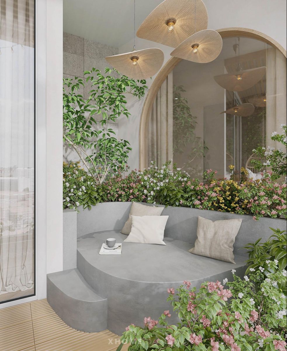 Không gian ban công xanh kết hợp tiểu cảnh hiện đại trong thiết kế thi công nhà trọn gói, tạo điểm nhấn thẩm mỹ và mang thiên nhiên vào không gian sống.